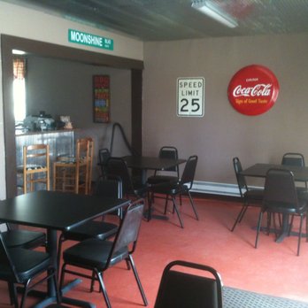 Big E's BBQ - tables and chairs in a restaurant - Barbeque Near Me - Kennett, Missouri Big E's BBQ - tables and chairs in a restaurant - Barbeque Near Me - Kennett, Missouri