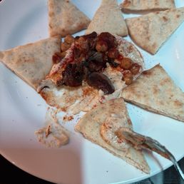 They also serve hot pita bread with hummus, which was a nice touch.