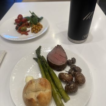 American Express Centurion Lounge - Was served a nice slice of filet mignon and a good variety of sides. ALL delicious - Airport Lounges Near Me - Houston, Texas American Express Centurion Lounge - Was served a nice slice of filet mignon and a good variety of sides. ALL delicious - Airport Lounges Near Me - Houston, Texas
