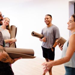 Las Olas Yoga - Community members chatting after class
