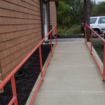 Rusty Cannon Motel - ramps up to doors at end of corridors - Hotels Near Me - Westfield, Pennsylvania