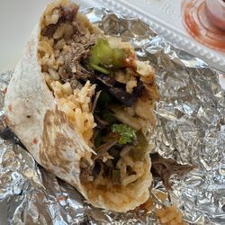 Amigos Mexican Grill - Half eaten Lunch Burrito