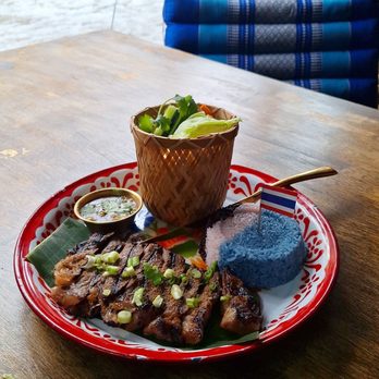 Rua Thai Restaurant - Crying Tiger: Grilled Marinated Ribeye Steak with Blue Butterfly Pea Jasmine Rice - Thai Near Me - Brooklyn, New York Rua Thai Restaurant - Crying Tiger: Grilled Marinated Ribeye Steak with Blue Butterfly Pea Jasmine Rice - Thai Near Me - Brooklyn, New York
