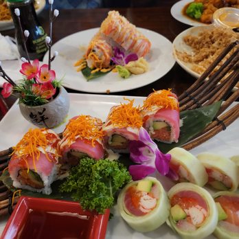 Sakura #16 - Winchester - Passion roll and rainbow Naruto roll. Dancing crab roll in the background - Asian Fusion Near Me - Winchester, Virginia Sakura #16 - Winchester - Passion roll and rainbow Naruto roll. Dancing crab roll in the background - Asian Fusion Near Me - Winchester, Virginia