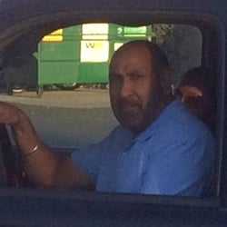Chevron - This a$$hole yelled at me for washing my windshield after buying $45 of diesel. He tried to intimidate me physically as well.