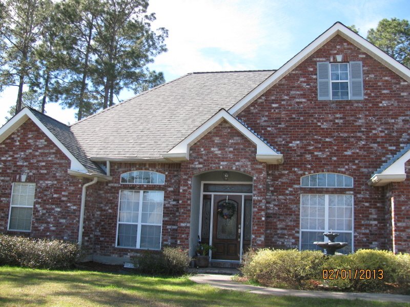 Slide of Magnolia Roofing