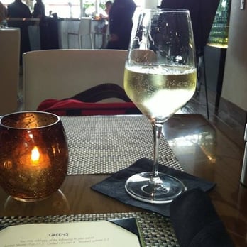 Beaudevin - Wine- looking out into the airport/terminal - Tapas/Small Plates Near Me - Charlotte, North Carolina