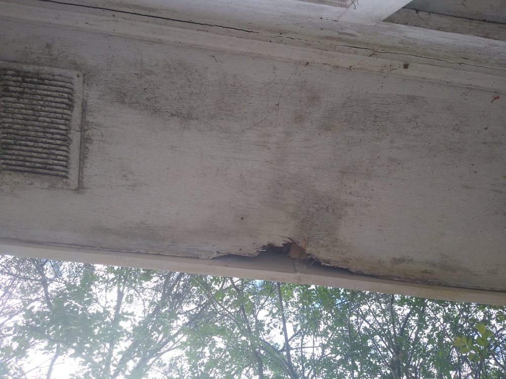 Slide of Tadlock Roofing