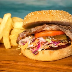 The Ancient Mariner - Steak burger made with Angus sirloin steak, alongside fresh, home-made thick-cut potato chips