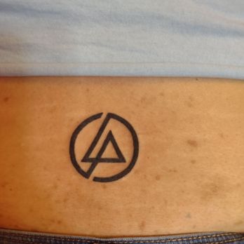 Inkflicted Tattoo - Symbol for Linkin Park on my lower back - Tattoo Near Me - Waipahu, Hawaii