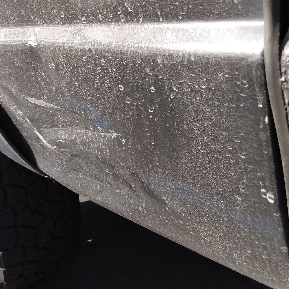 ROI Motors Burbank - Dent by my passenger side rear tire before repair. - Body Shops Near Me - Burbank, California ROI Motors Burbank - Dent by my passenger side rear tire before repair. - Body Shops Near Me - Burbank, California