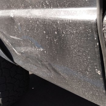 ROI Motors Burbank - Dent by my passenger side rear tire before repair. - Body Shops Near Me - Burbank, California ROI Motors Burbank - Dent by my passenger side rear tire before repair. - Body Shops Near Me - Burbank, California