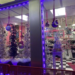 a store window decorated for christmas