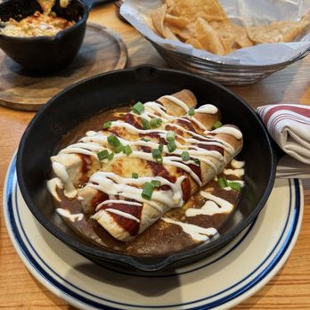 Nada - 'World Famous' Braised Chicken enchiladas - Mexican Near Me - Indianapolis, Indiana Nada - 'World Famous' Braised Chicken enchiladas - Mexican Near Me - Indianapolis, Indiana