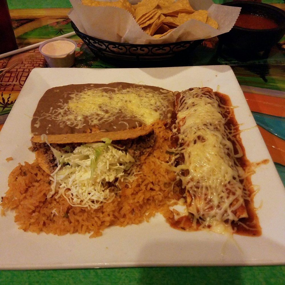 a plate of mexican food with rice and beans a plate of mexican food with rice and beans