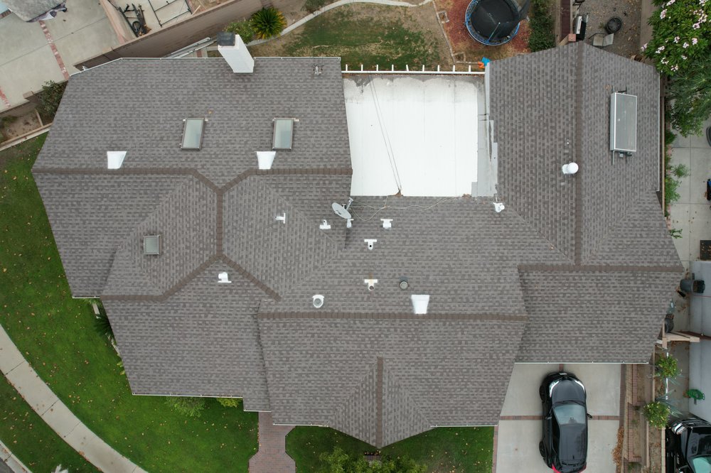 Slide of Prestige Roofing