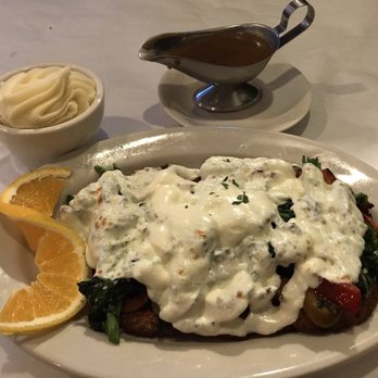 Canlon'S Restaurant - Chicken Cutlet with Broccoli Rabe  and melted mutz I had them add some sweet and hot peppers   The beginning - American Near Me - Staten Island, New York