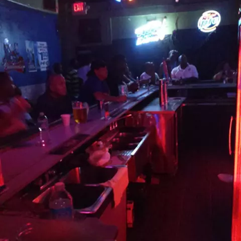 R Bar - a group of people sitting at a bar - Sports Bars Near Me - Miramar, Florida R Bar - a group of people sitting at a bar - Sports Bars Near Me - Miramar, Florida
