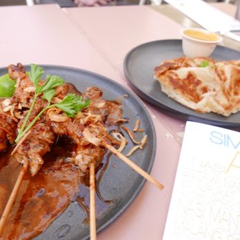 Simpang Venice - Some satay sticks and another appetizer that was absolutely on point... we let our Server pick the menu - Indonesian Near Me - Venice, California