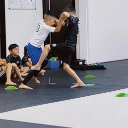My son used to be shy and afraid. It makes this mom's nerves ease up knowing he loves jiu jitsu and his little friends there.
