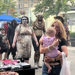 Louisville Zombie Attack - My oldest and youngest daughter at Lousiville Zombie attack 2022 at 4th st live