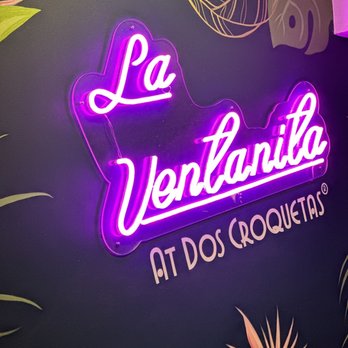 Dos Croquetas - Love the wallpaper and color scheme of this place! - Bakeries Near Me - Miami, Florida