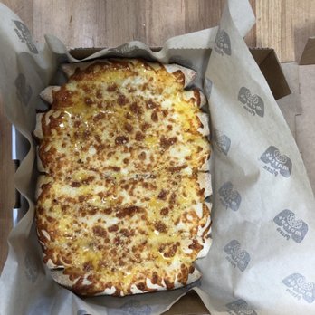 Marco's Pizza - Cheezybread. It comes with 1 ranch cup and 1 pizza sauce cup. - Pizza Near Me - Springdale, Arkansas