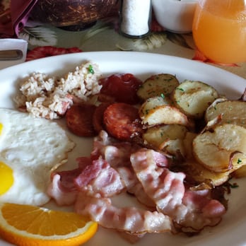 Coconut Grill - Two choice breakfast. Soft bacon and portuguese sasuage. The potatos are delicious! - American Near Me - Hilo, Hawaii Coconut Grill - Two choice breakfast. Soft bacon and portuguese sasuage. The potatos are delicious! - American Near Me - Hilo, Hawaii