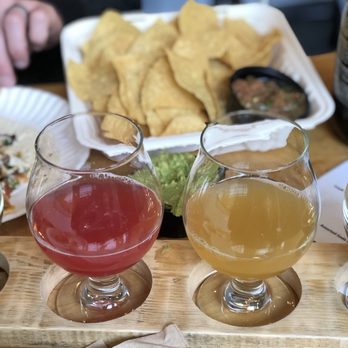 Smug Brewing - Two beers on my flight. I enjoy they have rotating food vendors most times I am here! - Breweries Near Me - Pawtucket, Rhode Island