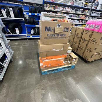 Walmart Supercenter - a stack of boxes in a store - Department Stores Near Me - Newcastle, Oklahoma