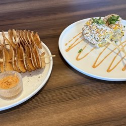 Mariachi Love - Potato spirals (left), Elotes, aka Mexican street corn (right)