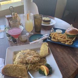 I can't remember the name of this dish but it was chicken smothered in a great sauce on top of pasta! And my fiancé got a burger.