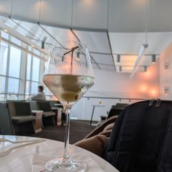 Delta Sky Club - Concourse F - Enjoying an extra dirty martini cocktail upstairs in the loft at the Delta Sky Club in Hartsfield (ATL airport) Concourse F.