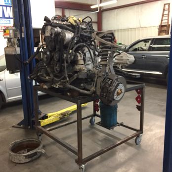 Salta Automotive - Volkswagen Touareg engine pulled out of the vehicle for timing chain repair. - Auto Repair Near Me - Denver, Colorado Salta Automotive - Volkswagen Touareg engine pulled out of the vehicle for timing chain repair. - Auto Repair Near Me - Denver, Colorado