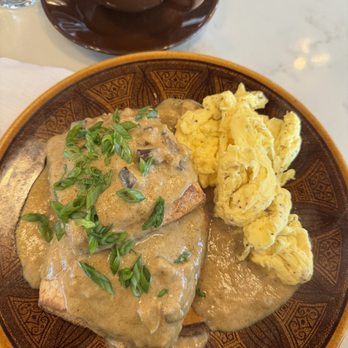 Uncle Wolfie's Breakfast Tavern - Biscuits with mushroom gravy. - Breakfast & Brunch Near Me - Milwaukee, Wisconsin Uncle Wolfie's Breakfast Tavern - Biscuits with mushroom gravy. - Breakfast & Brunch Near Me - Milwaukee, Wisconsin