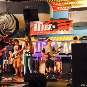 All Music - We sponsor the United Ink Tattoo Conventions. One of our school rock bands performing at the Cradle of Aviation convention - Musical Instruments & Teachers Near Me - Plainview, New York All Music - We sponsor the United Ink Tattoo Conventions. One of our school rock bands performing at the Cradle of Aviation convention - Musical Instruments & Teachers Near Me - Plainview, New York