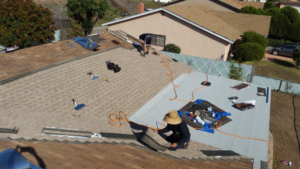 Slide of Kenney Roofing