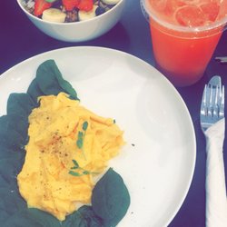 Little Gossips - Ordered the tropical açai bowl and spinach with scrambled egg and the liquid sunshine.