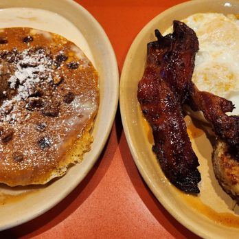 Snooze, an A.M. Eatery - Secret menu item Cinnamon Roll Pancake and Classic breakfast upgraded to candied bacon. Great! - Breakfast & Brunch Near Me - Tustin, California Snooze, an A.M. Eatery - Secret menu item Cinnamon Roll Pancake and Classic breakfast upgraded to candied bacon. Great! - Breakfast & Brunch Near Me - Tustin, California
