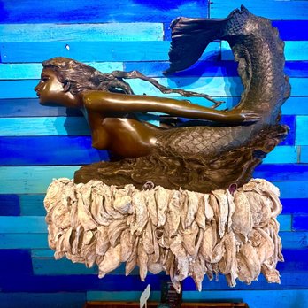 Fish Tales Pub and Grill - a statue of a mermaid - Pubs Near Me - Brunswick, Georgia
