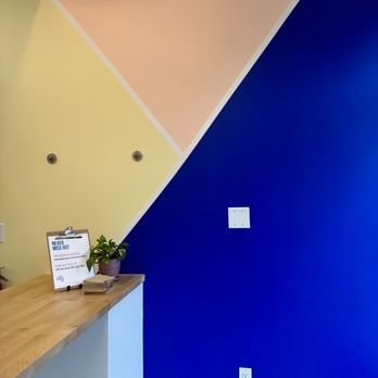 Elmo Baking - a kitchen counter with a blue and yellow wall - Bakeries Near Me - Port Moody, British Columbia Elmo Baking - a kitchen counter with a blue and yellow wall - Bakeries Near Me - Port Moody, British Columbia