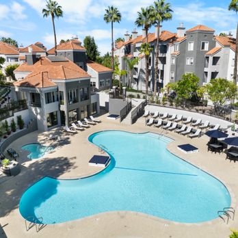 The Grand - Lounge by our sparkling blue pools - Apartments Near Me - Costa Mesa, California The Grand - Lounge by our sparkling blue pools - Apartments Near Me - Costa Mesa, California