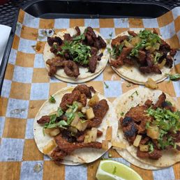 Al Pastor Tacos, Carne Asada Tacos, Hot Chicken Taco, and Chorizo Taco Al Pastor Tacos, Carne Asada Tacos, Hot Chicken Taco, and Chorizo Taco