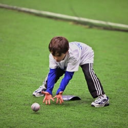 Unlimited Sports Action - Baseball Class at Unlimited Sports Action! One of our younger players learning proper fielding techniques.