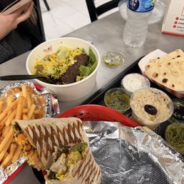 Create your own Chicken tikka wrap, create your own bowl with beef kabob, fries, baba ganoush and spicy shack