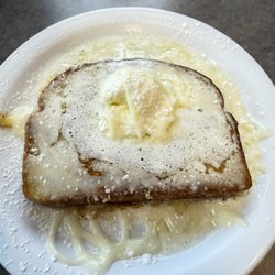 Market Cafe - French Toast, butter, powdered sugar and their glaze.