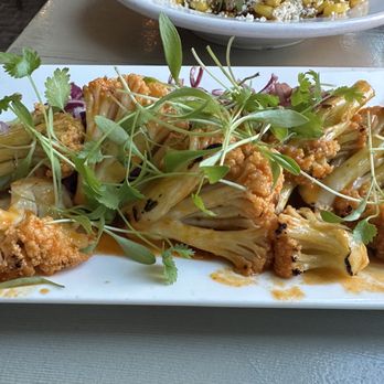 South Edison - BUFFALO CAULIFLOWER - house slaw, avocado-coconut purée - Seafood Near Me - Montauk, New York South Edison - BUFFALO CAULIFLOWER - house slaw, avocado-coconut purée - Seafood Near Me - Montauk, New York