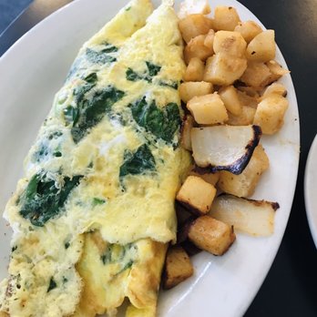 Sam's On the Harbor - an omelet and potatoes - Breakfast & Brunch Near Me - Scituate, Massachusetts Sam's On the Harbor - an omelet and potatoes - Breakfast & Brunch Near Me - Scituate, Massachusetts