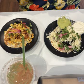SaugaTaco - Spicy Mezcal Paloma, Poke taco, steak fajita taco with cheese, greens, and guac - Tacos Near Me - Saugatuck, Michigan