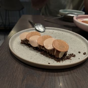 Published on Main - coffee mousse with caramelia, toffee discs and a malted barley crumble - Tapas/Small Plates Near Me - Vancouver, British Columbia Published on Main - coffee mousse with caramelia, toffee discs and a malted barley crumble - Tapas/Small Plates Near Me - Vancouver, British Columbia